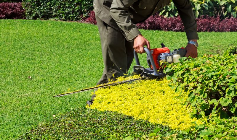 Landscaper with Trimming Tools